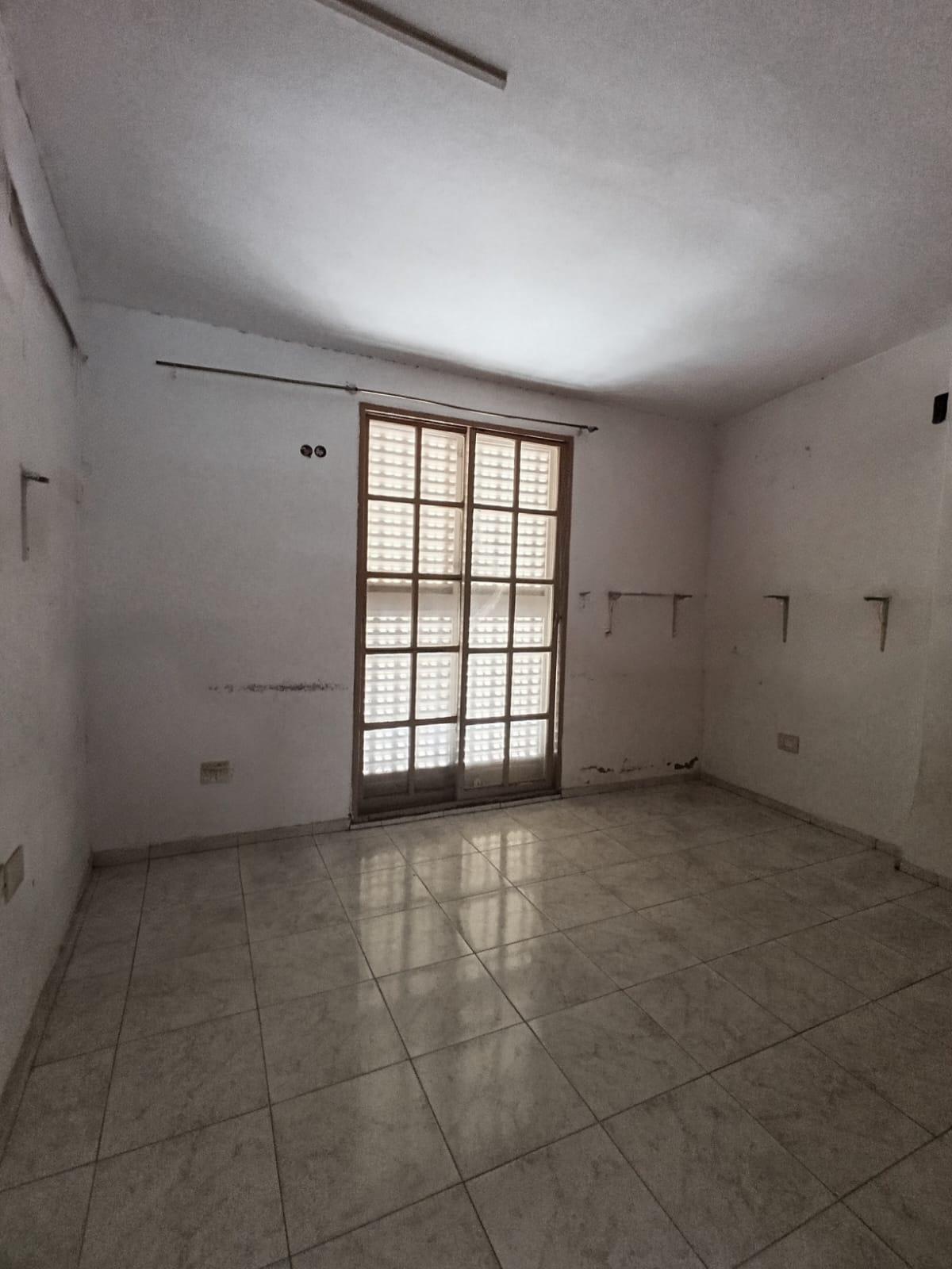 SE VENDE 2 LOCALES COMERCIALES Y 2 DEPARTAMENTOS EN ARROYITO (ZONA CENTRO), miniatura